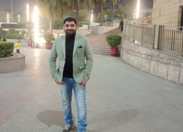 Yogesh in white suite